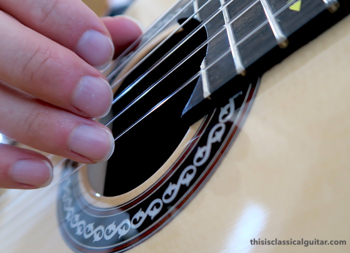 Nail Contact on String for Classical Guitar - a finger